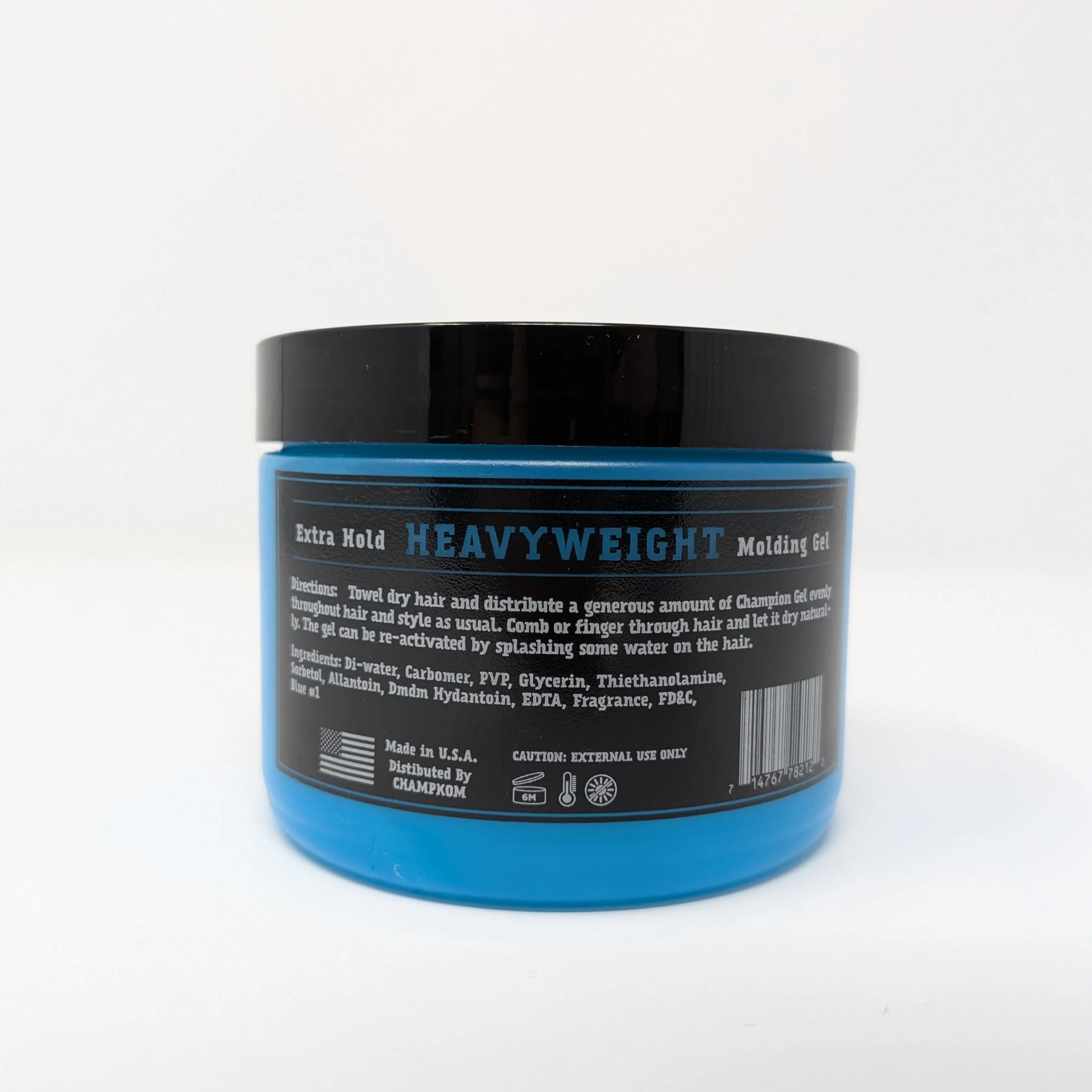 Blue jar with black lid on a white background